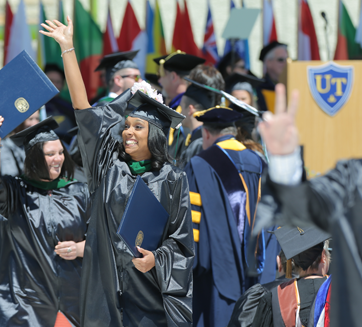 Student receiving degree at The University of Toledo commencement